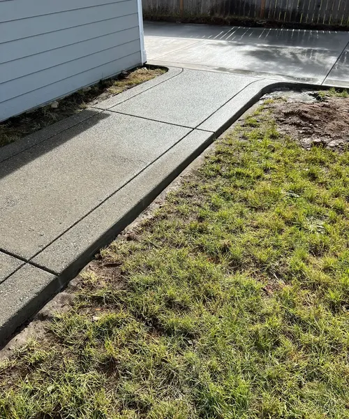 Broom finish driveway with decorative smooth finish borders, exposed ...